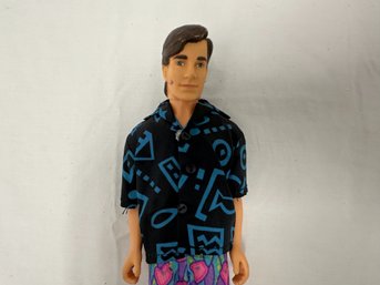 A Boy Doll In Barbie Style