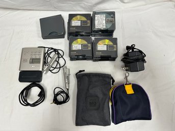 A Vintage Sony Walkman And Mini Disks