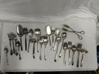 A Collection Of Serving Utensils