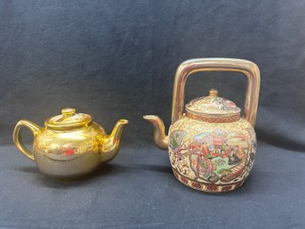 Two Gold Teapots