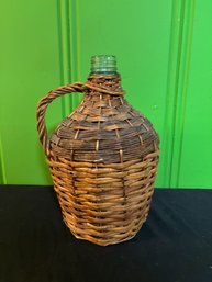 Rustic Wicker Wrapped Green Glass Bottle With A Handle 14'