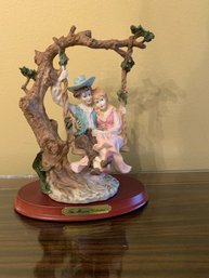 The Messina Collection Porcelain Couple On A Swing