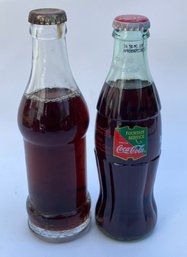 21. Vintage 8oz Coca Cola Soda Bottles With Soda