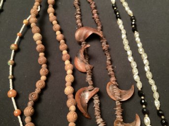 A Selection Of 7 Necklaces In Mainly Natural Materials Stone Wood Clay Pods