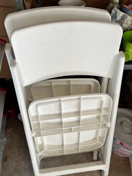 2 White Folding Chairs, Resin