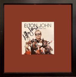 Elton John Signed CD Cover For Rocketman Number Ones