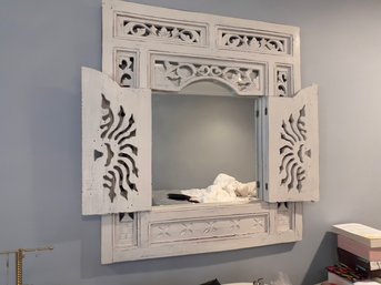 Wooden Mirror With Two Doors That Open And Close
