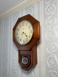 A Colonial Wooden Wall Clock