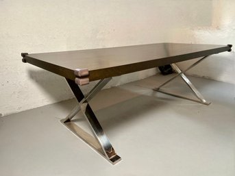 An MCM Dining Table With Chrome Cross Legs