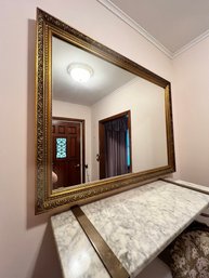 Gilt Mirror With Scrolls And Foliate Designs