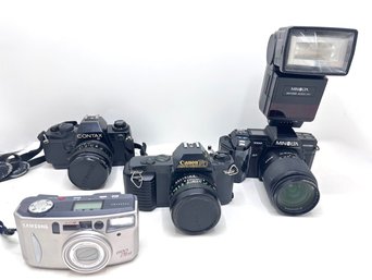 4 SLR Cameras: Minolta With Flash, Contax, Canon & Samsung