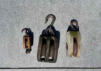 Three Antique Wood & Iron Pulleys