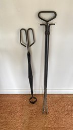 A Pair Of Iron Fireplace Tools