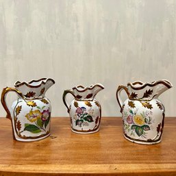 A Collection Of 3 Antique Floral  Transfer Ironstone Copper Luster Pitchers