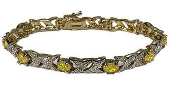 Gold Over Sterling Silver Bracelet Having Opal And White Stones