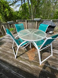 Outdoor Glass Top Table With 4 Matching Aluminum And Mesh Chairs