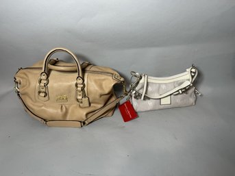 A COACH LEATHER BAG AND A DOONEY AND BURKE HANDBAG