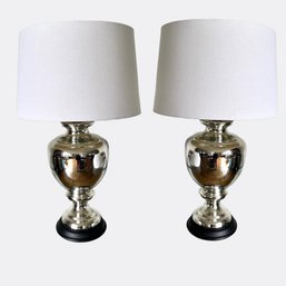 A Pair Of Mercury Glass Lamps With White Shades