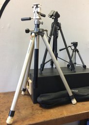 A Group Of Three Tripods