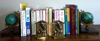 Globe And Brass Bookends With Assorted Hardcover And Softcover Books