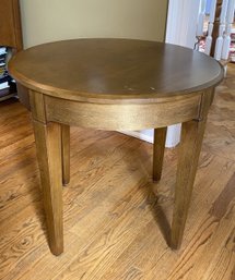 An Ethan Allen Cherry Wood Round Occasional Table