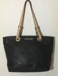 A41. Michael Kors Black Leather, Cream Leather Strap Tote Handbag.