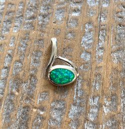 Small Sterling Silver And Opal Pendant