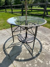 Brown & Jordan Glass Topped Round Patio Table.  Umbrella And Umbrella Stand Not Included.