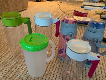 Group Of Plastic Pitchers And Personal Drink Containers