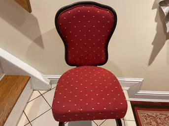 Red Chair With Gold Stitching