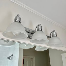 A Triple Chrome Sconce With Frosted Glass Shades - Bath3
