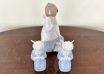 Lladro Angel With Baby And Two Small Angel Figurines