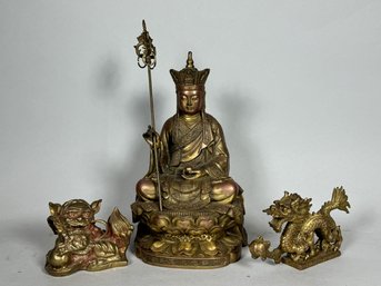 A PAINTED BRONZE BUDDHA FIGURE W/ FOO DOG