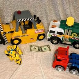 Collection Of Work Trucks And Transformers