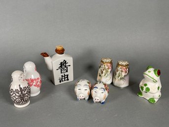 Variety Of Salt  & Peppers Shakers & Soy Sauce Pot