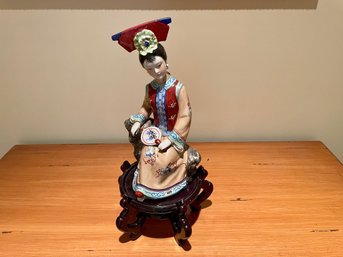 Ceramic Asian Female Seated Figure On Teak Stand