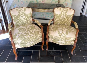 A Pair Of Antiques Upholstered Arm Chairs