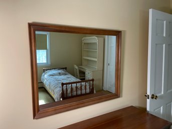 A Large Solid Wood Mirror