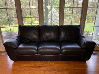 A Black Leather Natuzzi Sofa