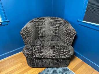 A Great Comfy Swivel Accent Chair With Geometric Pattern