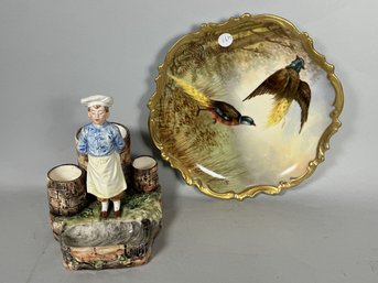 A HAND PAINTED BIRD PLATE AND A STAFFORDSHIRE CHEFS ASSISTANT