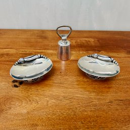 A Pair Of Georg Jensen Antique Sterling Silver Salt Cellars And A Bottle Cover