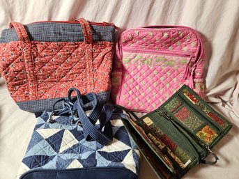 Four Fabric Purses, One Backpack Style, One Clutch Style