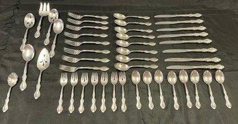 A Serving Set For 8, Stamped 1847 Rogers Bros. Stainless Flatware Plus Serving Pieces