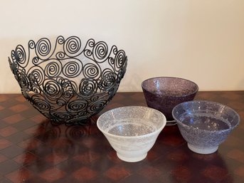 A Metal Swirl Design Fruit Bowl Together With A Set Of 3 Glass Bowls