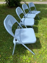 4 Light Blue Folding Chairs