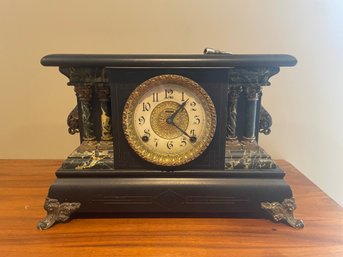 A Reproduction Mantle Clock With Faux Marble