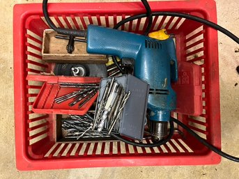 Makita Electric Drill And Basked Of Assorted Drill Bits