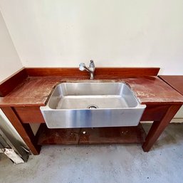 A Solid Wood Workbench With A Kohler Commercial Sink - Garage