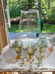 Colored Shot Glasses, Cordials, With Pitcher With Applied Handle.